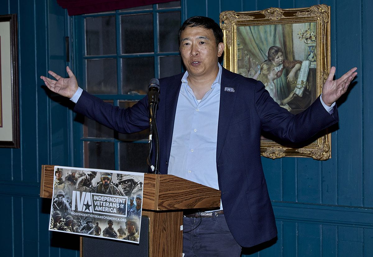 Andrew Yang speaks from the Independent Veterans of America podium
