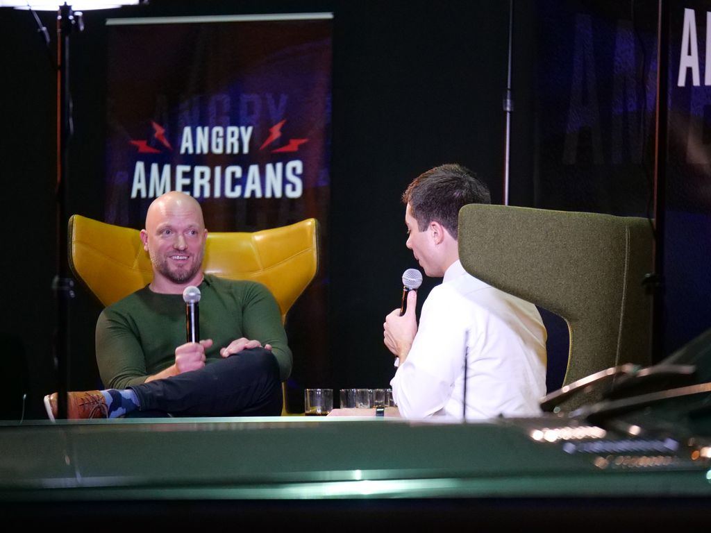 Paul Rieckhoff interviews Pete Buttigieg on stage